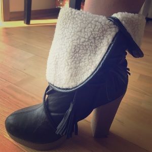 High heel boots with folded faux sheep fur